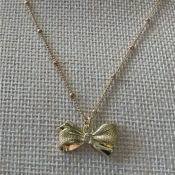 Elegant Gold Bow Necklace - Picture 2 of 2